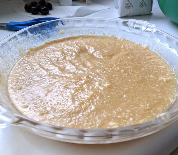Image of Put Walker's Shortbread cookies and raw macadamia nuts in blender and pulse until fully mixed. Add to melted vegan butter and press mixture into the base of a glass pie dish. Refrigerate while making filling.